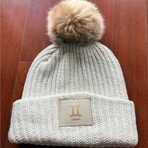 Love Your Melon Gemini Cream Knit Beanie with Tan Pom